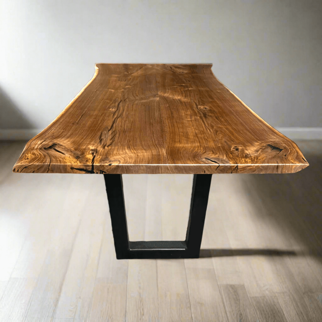 Book-matched live edge table with natural wood grain, featuring metal legs for a modern aesthetic.
