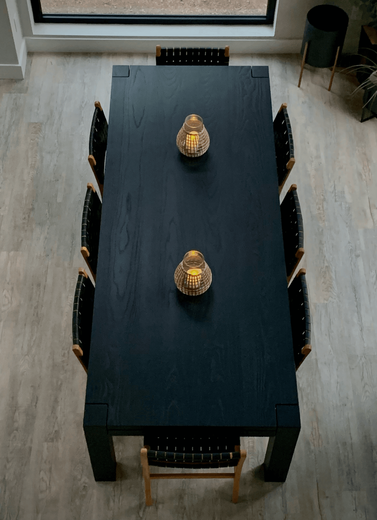 Modern European style dining table with sleek flush legs and two decorative lights, suitable for customizable size and wood tone options.